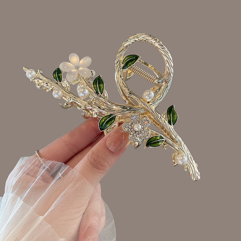 Elegant Floral Pearl & Green Leaf Hair Claw Clip – Gold Tone